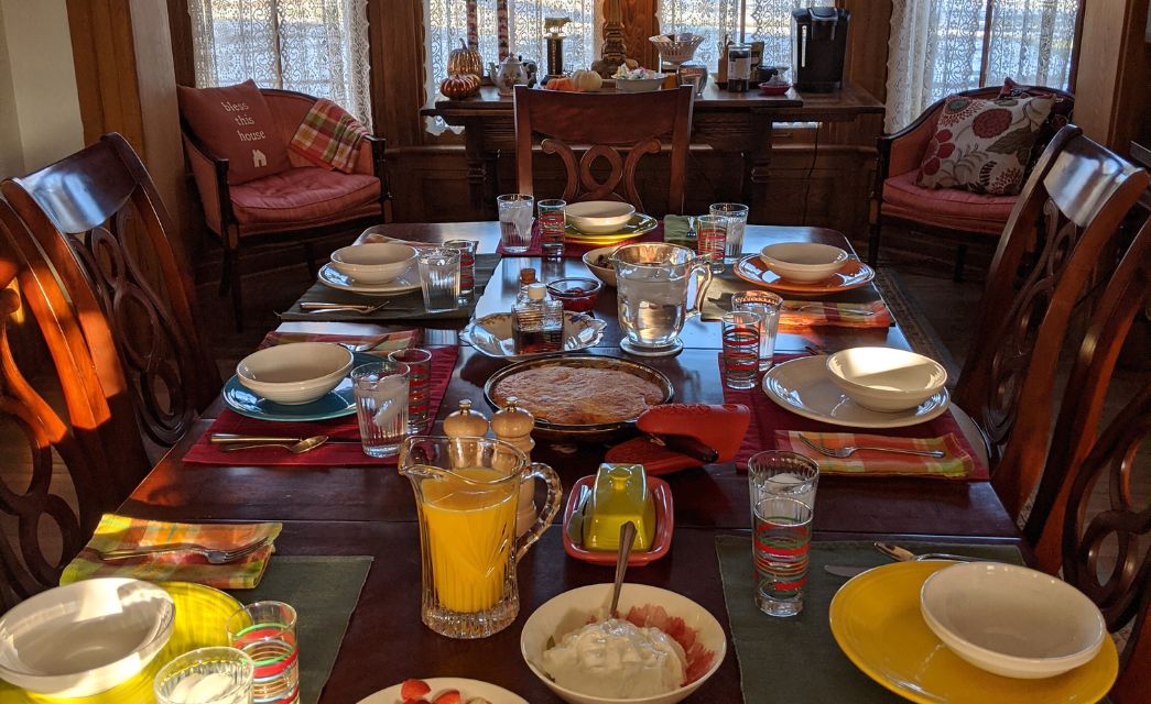 Dark wood dining room table set for 8 for breakfast